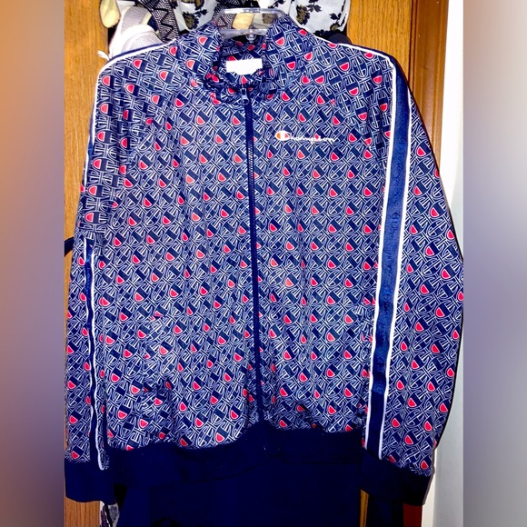 Women’s XL Champion track suit. It’s blue with champion logo all over. - Picture 1 of 2